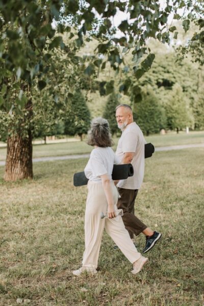 Adult walking outdoors to support movement for healthy joints in Mooresville, NC
